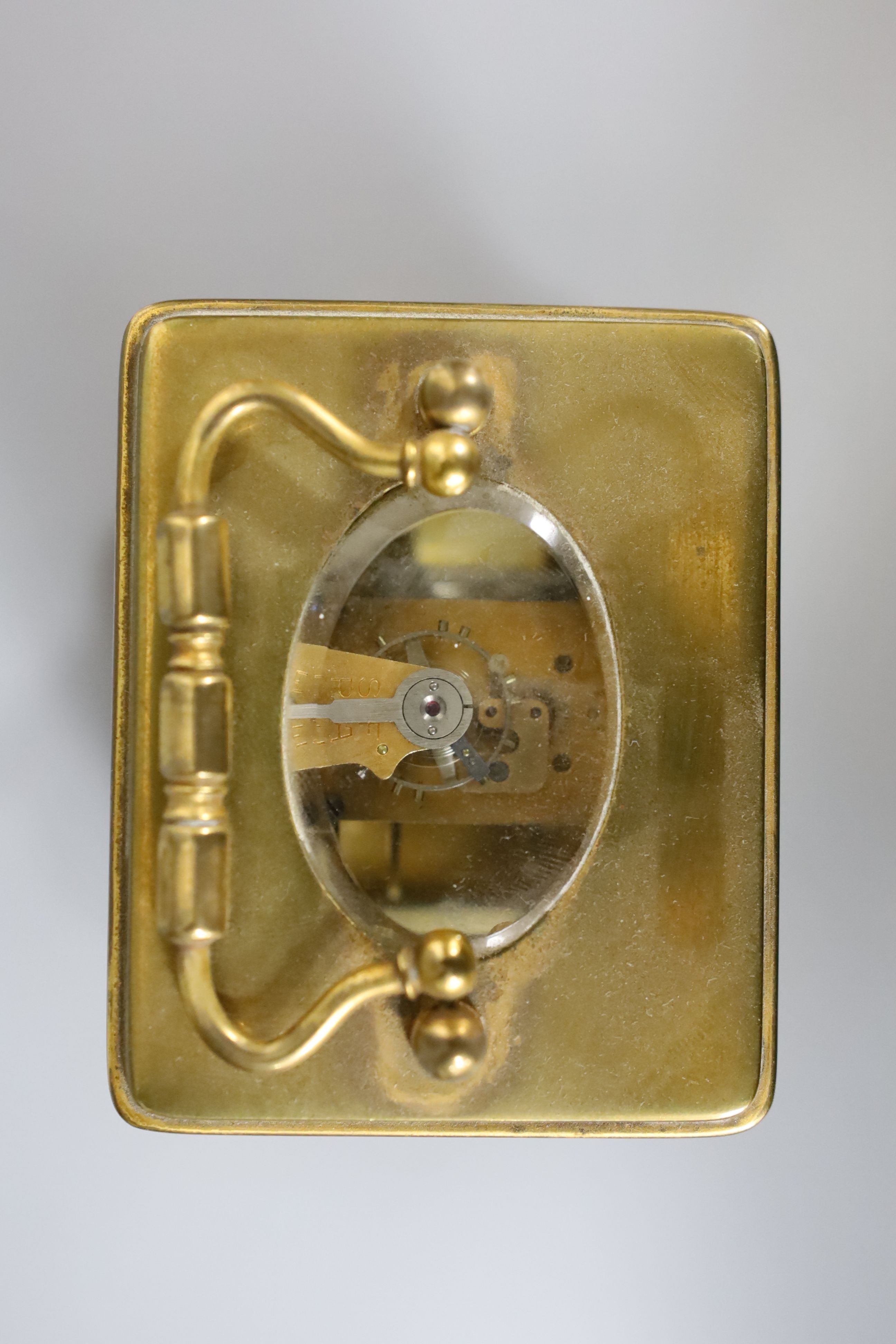 A small French brass carriage timepiece, 12cm